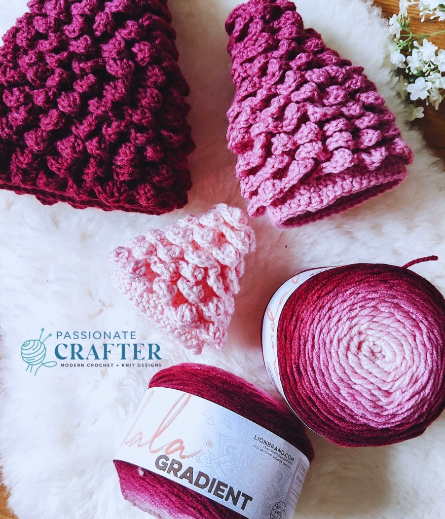 crochet christmas tree made with lion brand mandala gradient yarn in pink colors