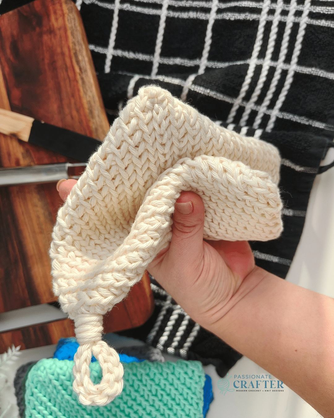 double thick crochet potholder in cream color folded in my hand